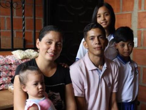 Miguel with his family from Venezuela
