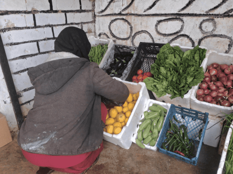 Maram* buying groceries for her family. 