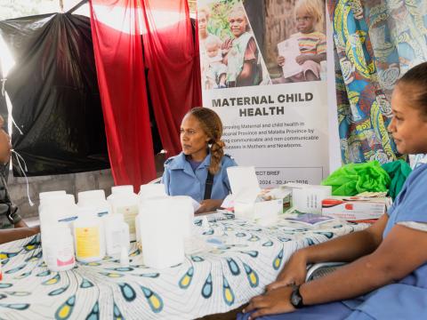 Healthcare workers at outreach clinic