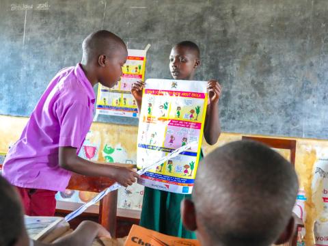 Children In class using the ICE materials Provided by World Vision Uganda