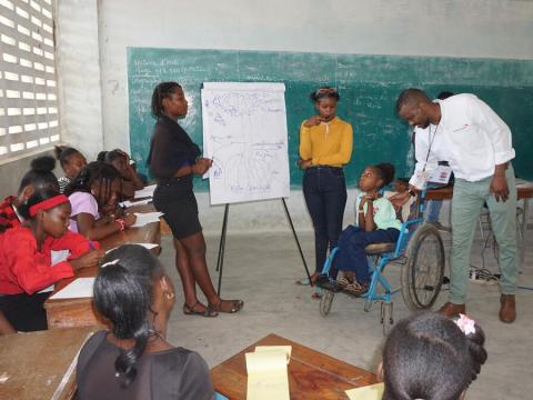 Dominique giving trainings on the CVA with Children, Adolescents, Youth and Leaders ( Church and community).