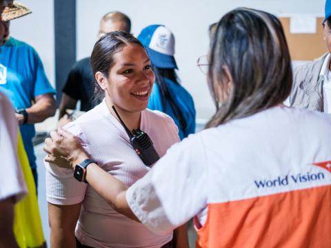 Daniela Romero, 27 from Venezuela meeting WV staff