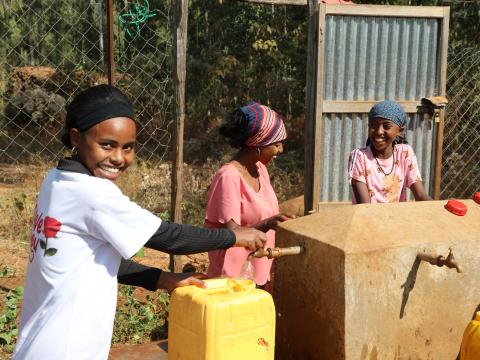 Ebbise and her friends fetching water