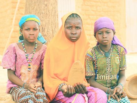 Khadidja surrounded by her friends