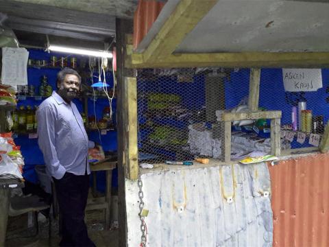 Charlie standing in his shop