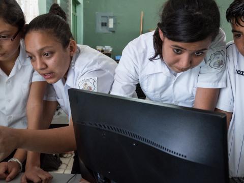 Children at Juan Ramon Molina school technology project in Tegucigalpa, Honduras demonstrate their graphic design skills. 