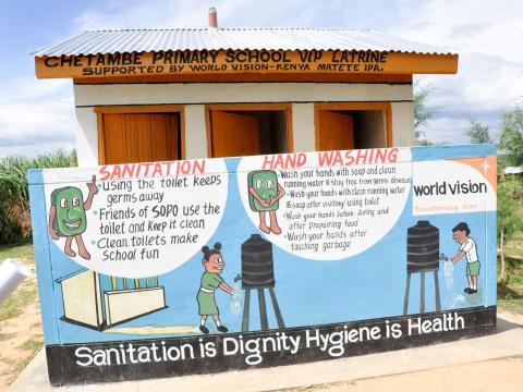 A latrine with hygiene and sanitation wall murals. The latrine was constructed with support from World Vision in Kakamega, Kenya. ©World Vision