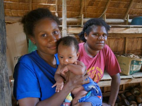 VHV Julie (right) with Mary and her baby.