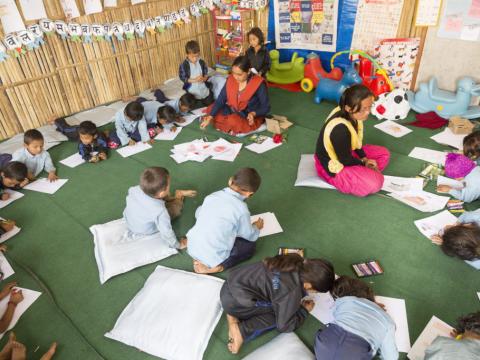 Children in a temporary learning space in Nepal