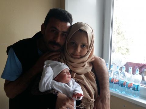 A new life arrives in Serbia - Ola and her husband Kaisar with baby Omar