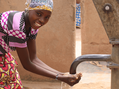 "I am very happy to have drinking water now because before we had to walk a lot to get water", says Ramatou "I am very happy to have drinking water now because before we had to walk a lot to get water", says Ramatou