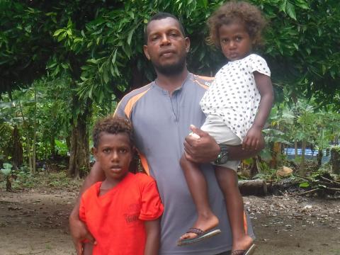 Samuel Bako and his two kids.