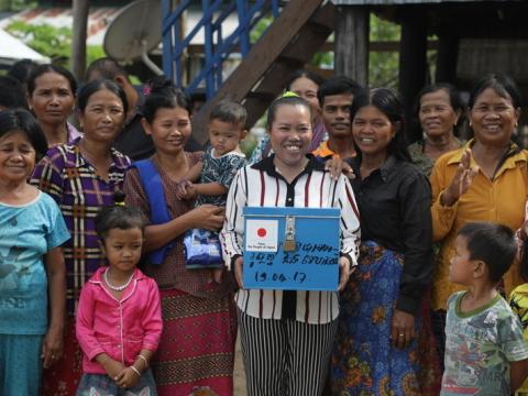 Photo of community holding Healthy Box Saves Newborn Photo of community holding Healthy Box Saves Newborn