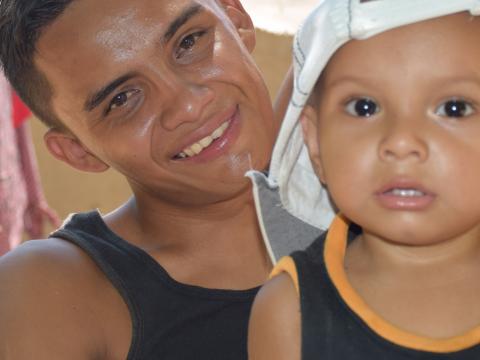 Zika survivor Bryon Carranza and his son, Andrew