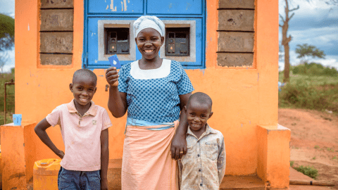 Mother with two children Grundfos Wrold Vision Partnership