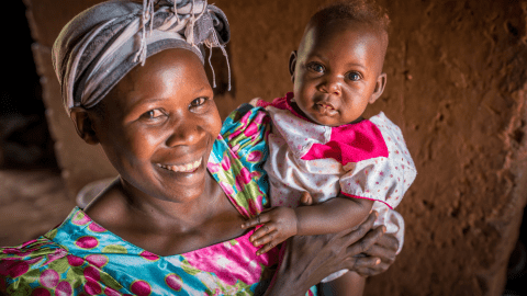 Mother holding child