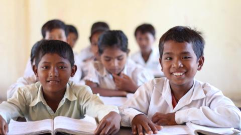 Khmer boys sitting at their desks in class, Cambodia