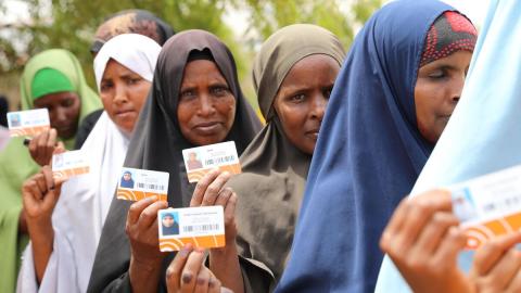 IDPs and drought-affected beneficiaries lining up to receive a cash distribution from World Vision and its CCD partners in Somali region, Ethiopia, as part of our humanitarian disaster management team's cash and voucher assistance programming promoting dignity for people affected by emergencies, providing them with choice, dignity, and flexibility while helping build resilience, by driving the recovery of local markets.