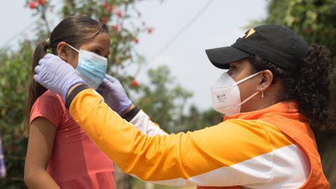 staff takes care of children - honduras