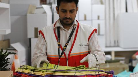 WVI Nepal staff packs Personal Protective Equipment sets at the national office before the kits were dispatched for handover in the working districts. 