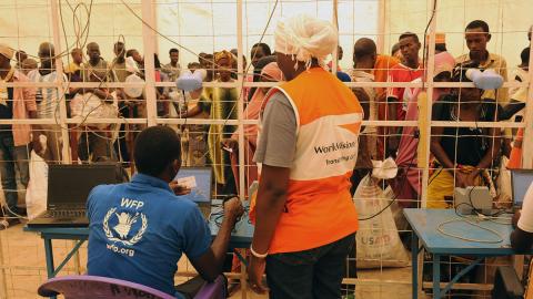 World Vision and WFP staff at a distribution