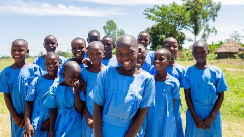Girls in blue school uniforms in Uganda