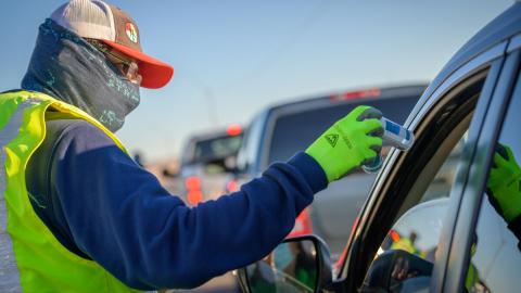 “This is a very dangerous virus, but we’re doing our very best to take it seriously here on the Navajo Nation,” says Navajo Nation President Jonathan Nez at a checkpoint where he’s sharing masks, hand sanitizer, and information about COVID-19. (©2020 World Vision/photo by Laura Reinhardt)