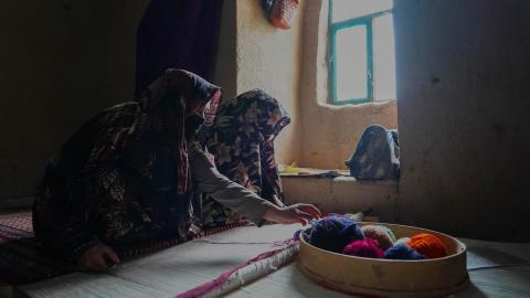 Maryam weavering carpets