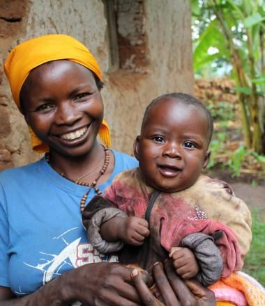 A mother holds her baby in Burundi