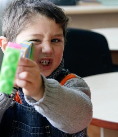 Boy playing with lego