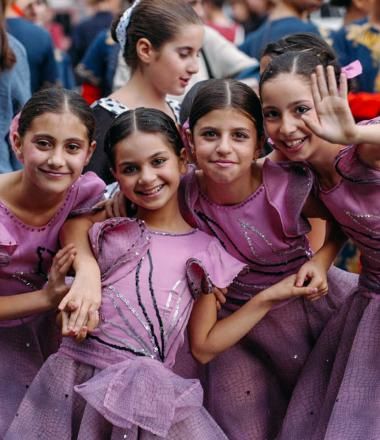 Armenian girls in purple dance dresses