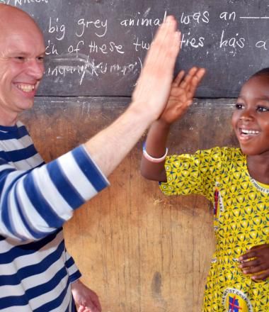 Andrew Morley meets sponsored child Ivy