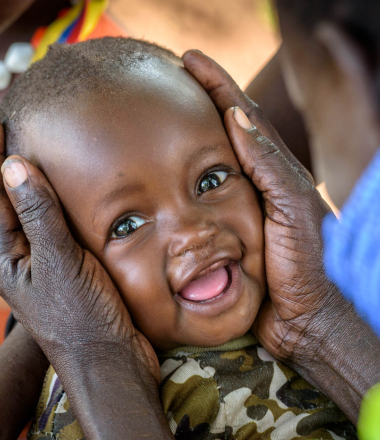 Baby being held