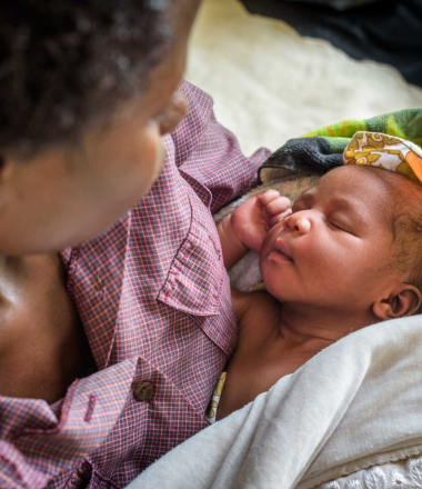 Mother breastfeeding infant