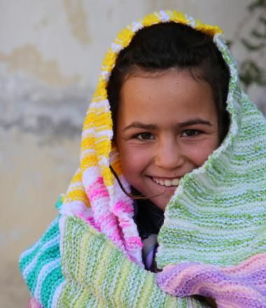Girl wrapped in blanket