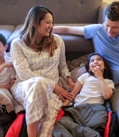 Family of four sitting together