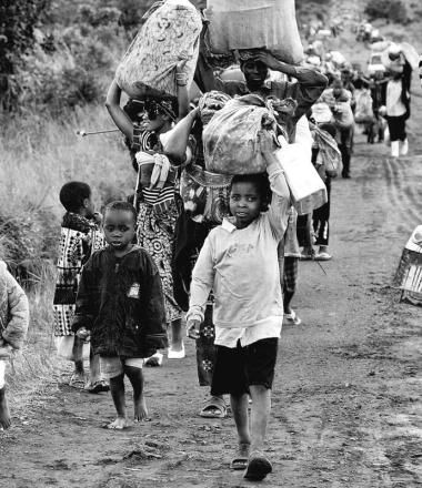 Refugees walking along a road