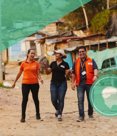 Mindsets and behaviours, world vision staff walking on road in Colombia