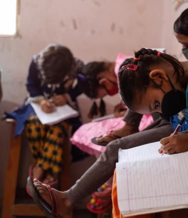 Child studies in her classroom during COVID-19