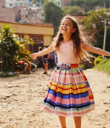 Girl dances in the streets in Colombia