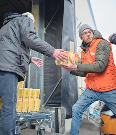 WV volunteer helps load food into a truck