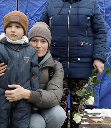 Ukrainian mother flees war with her son who thinks he is going on vacation.
