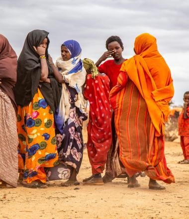 Displaced women walking