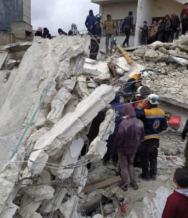 Collapsed building following earthquake in Turkey and Syria
