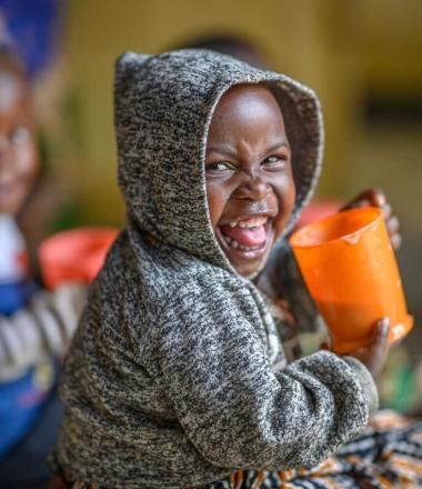 Sifa, 2, goes to ECD center at home, registered girl
