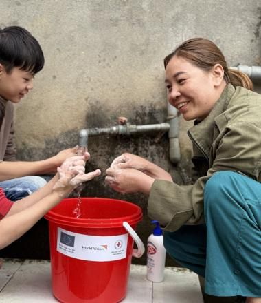 Family affected by Typhoon Yagi use a hygiene kit provided as part of an ECHO-funded project where World Vision is one of the implementors.