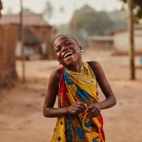 A girl smiles in Ghana