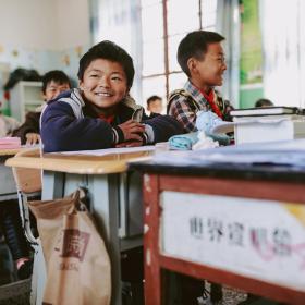 Boys studying in their school classroom