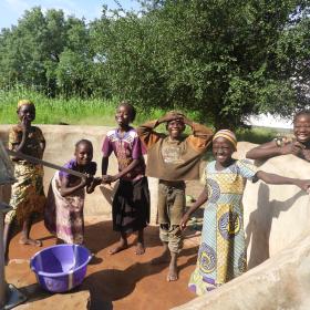 the students of the official school of MangaDomgo receiving their water point.JPG