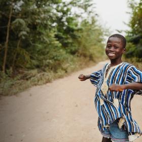 A Boy in Ghana on a road